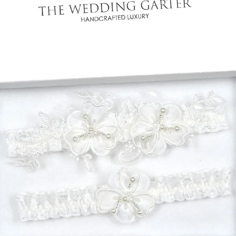 Charming Ivory Floral Garter Set With Pearls